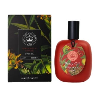Bergamot and Ginger Body Oil with botanically illustrated packaging.