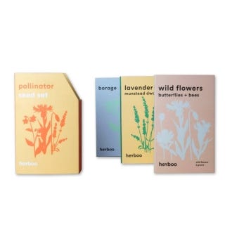Image of the seed set with the three different packets of seed variety.