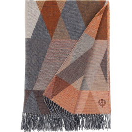 Fraas Cashmink Blanket folded in a rectangle, featuring a triangle -shape design in the tones of rust and greys.