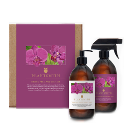 On white image of Nurturing Orchid Food and Tonic an Orchid Care Mist in front of gift box. 