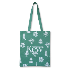 Image of the tote bag with white floral design and Kew logo on a green base.