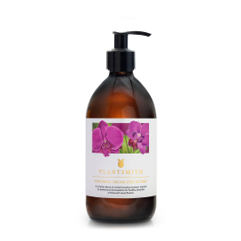 On-white image of Orchid feed and Tonic with white label displaying an illustration of beautiful purple orchids. Gold writing on label reads: A complete blend of orchid boosting nutrients, inspired by professional formulations for healthy, beautiful orchi