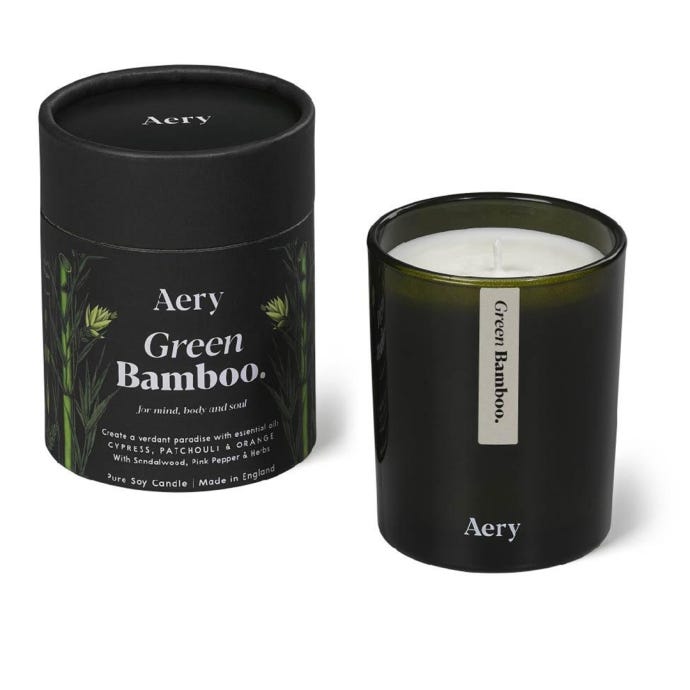 Aery Green Bamboo tube with candle displayed.
