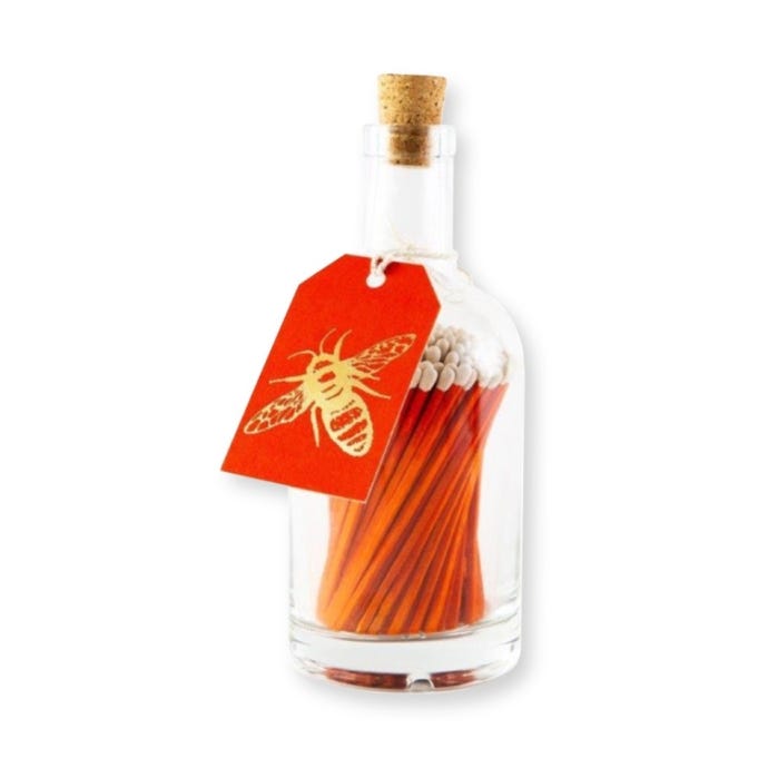 Gold bee matchstick bottle