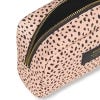 Close up image taken from above of light pink wide pouch with small, black cheater spots surrounding. Golf zip is undone to show black interior.