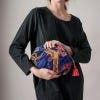 One Hundred Stars - Climbing Peacock Blue Velvet Pouch, lifestyle image