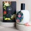 Jasmine Peach Body Oil 100ml bottle, with botanically illustrated packaging.