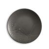 One of the black plates in the set of four depicting a close up design of a winged insect.