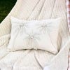 Palm Tree Embroidered Cushion from Walton & Co, lifestyle image