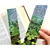 Lifestyle image of the bookmark featuring the waterlily house at Kew Gardens