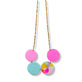 Circular necklace on a gold chain featuring four handmade polymer clay circles. Two in pink, one in blue with purple speckles and one with an array of colours (pink, purple, blue and green)